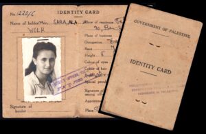 לוט 118 – תעודת זהות מנדט בריטי פלשתינה מס' 1220/C, מיס שרה וולק, תל-אביב | Lot 118 – British Mandate Palestine ID Card No. 1220/C, Miss Sara Ala Wolk, Tel Aviv District